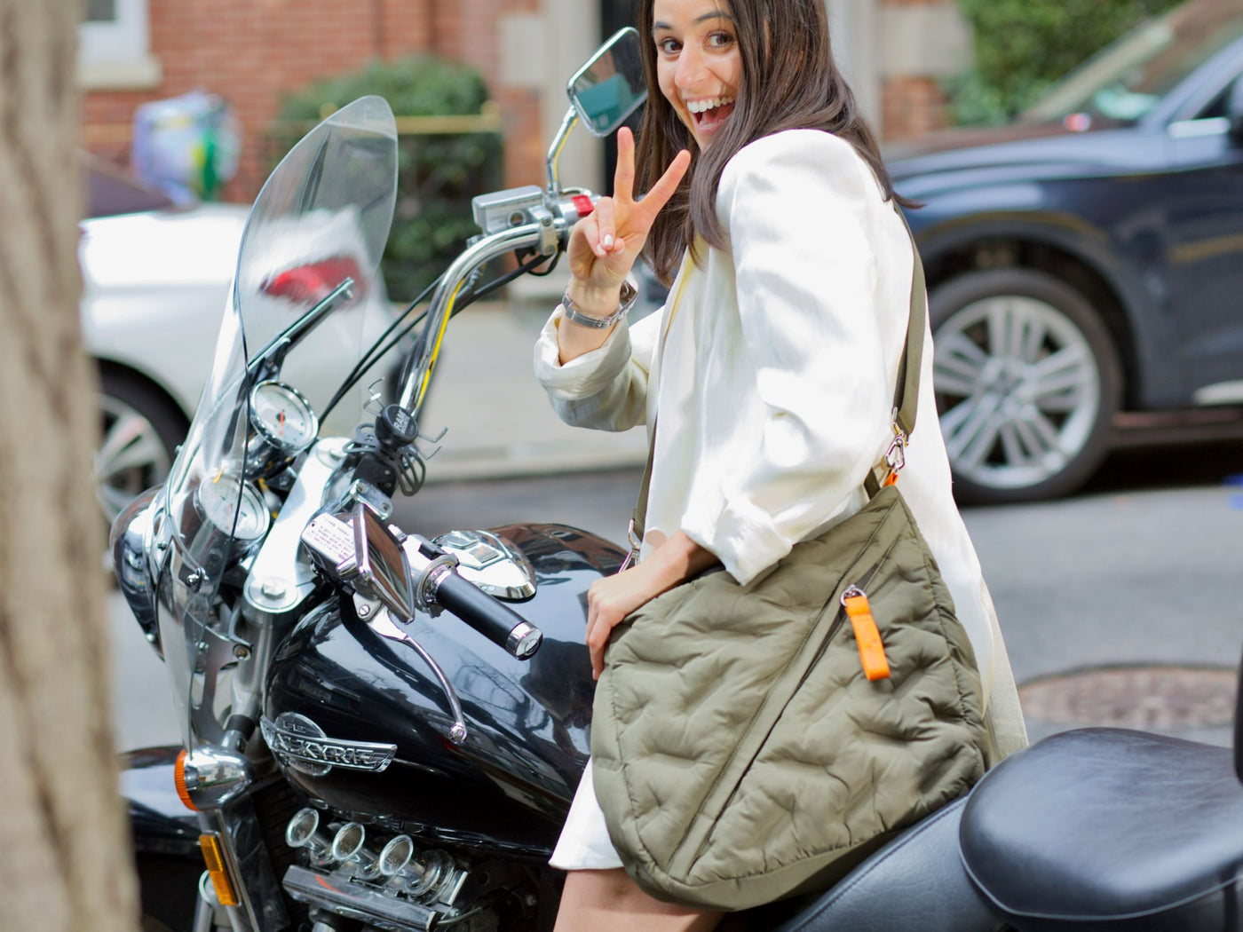 The messenger bag is the perfect accessory for the woman on the go #color_olive