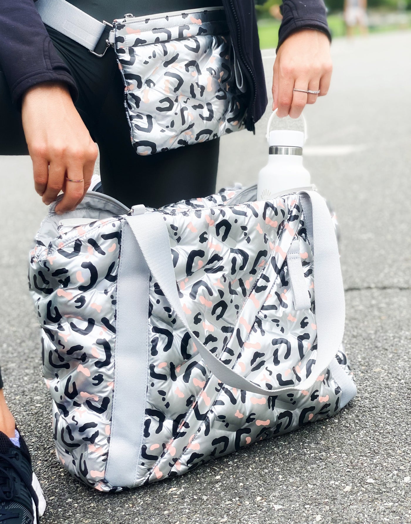 This versatile bag comes with a matching crossbody bag, perfect for all your adventrues The lightweight gym tote is designed to take you from the gym to work and beyond  #color_silver-blush-cheetah