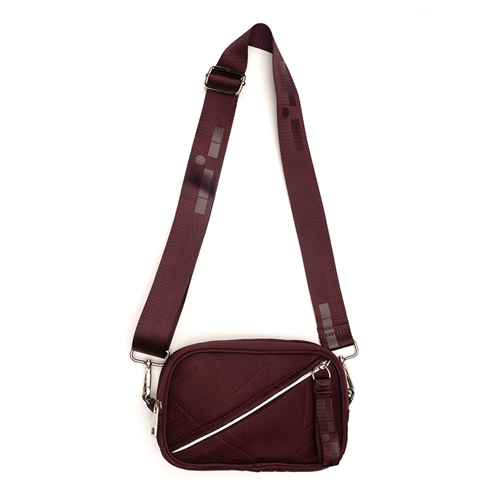Deceivingly roomy oval snap on snap off pouch that can be worn as a crossbody bag with the additional, adjustable strap.  #color_bordeaux-mesh